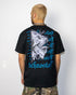 Inner Demon Techno T-Shirt oversized in schwarz für Raver, Mann von hinten fotografiert